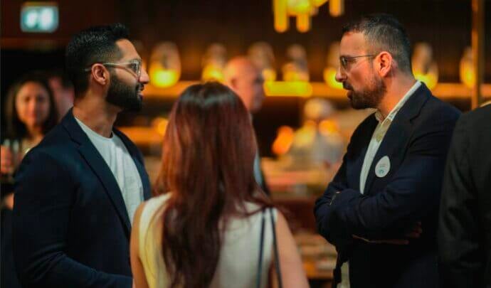 Three people speaking at the GCC event